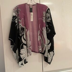 Floral poncho. New with tags.